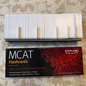 Kaplan MCAT 528 Advanced Prep Book in Black and Orange